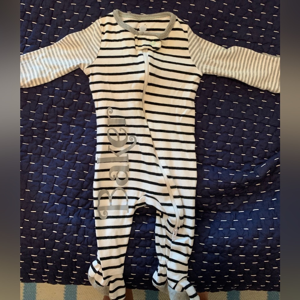 Onesie with name Baker on it. It’s a cloud island size 0-3 mos.